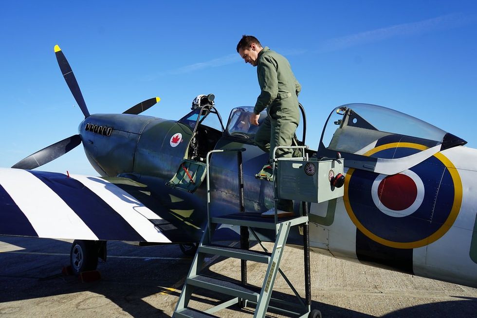 Robert Jenrick getting out of a Spitfire