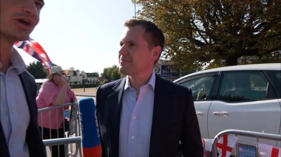 Robert Jenrick joins anti-migrant protests in Epping