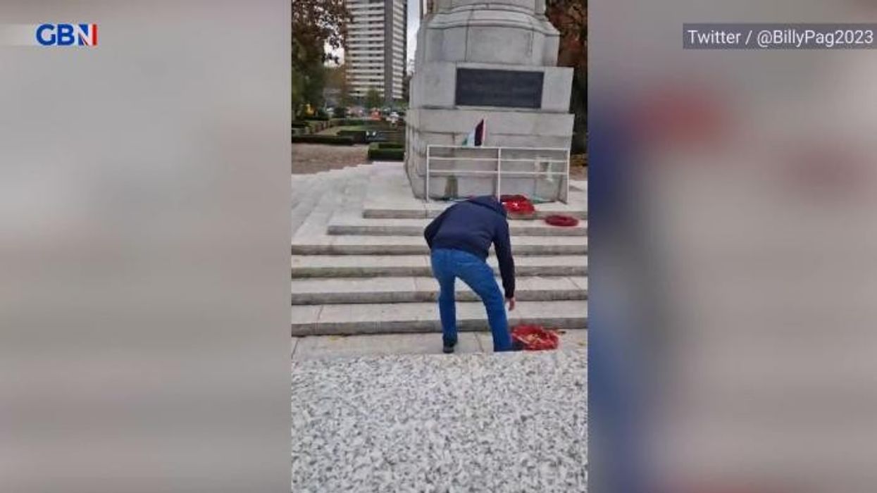 Poppies STRIPPED from Rochdale cenotaph as activists dress monument with Palestinian flags