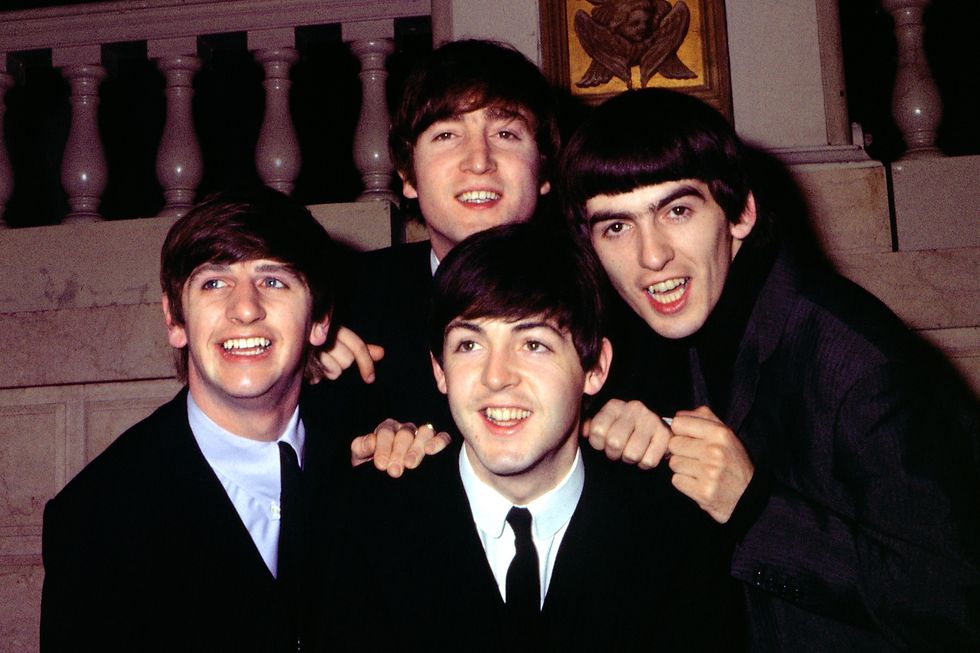 Rock and roll band "The Beatles" pose for a portrait wearing suits in circa 1964. (L-R) Ringo Starr, John Lennon, Paul McCartney, George Harrison