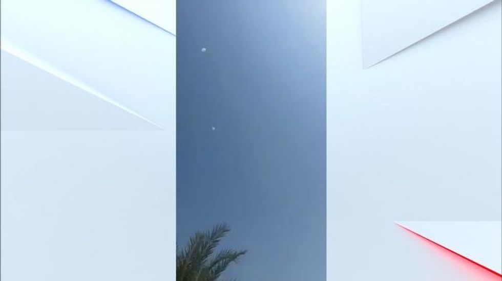 Rockets were also intercepted overhead as people sat by a pool in Dubai