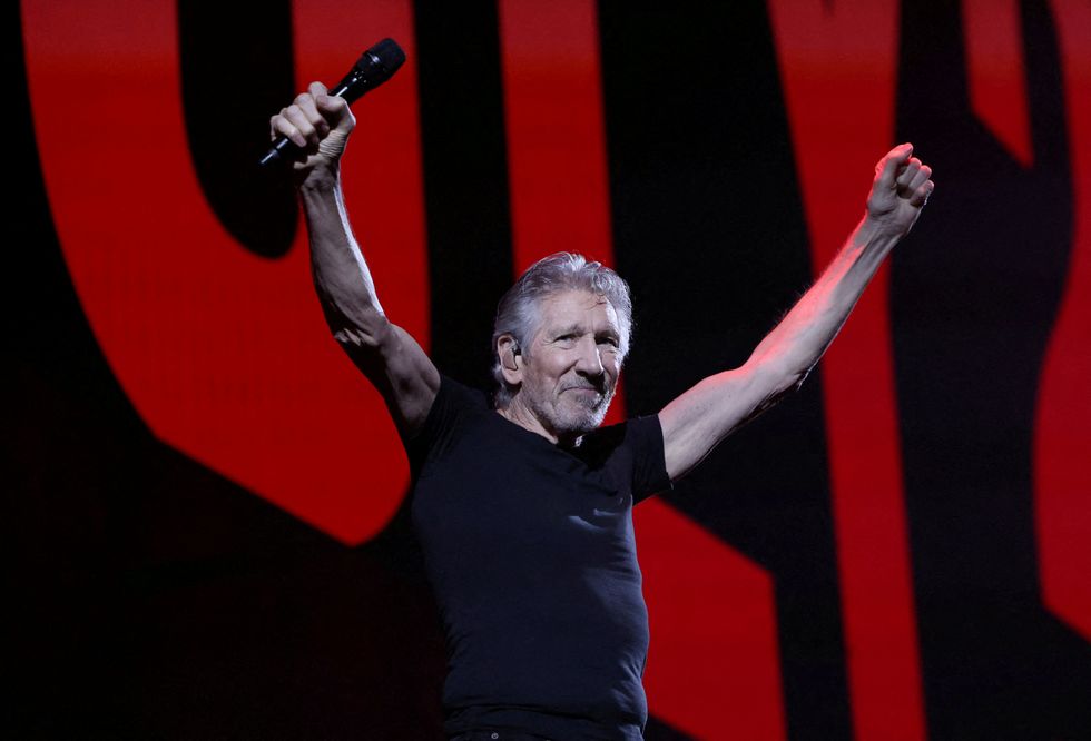 Roger Waters with arms aloft