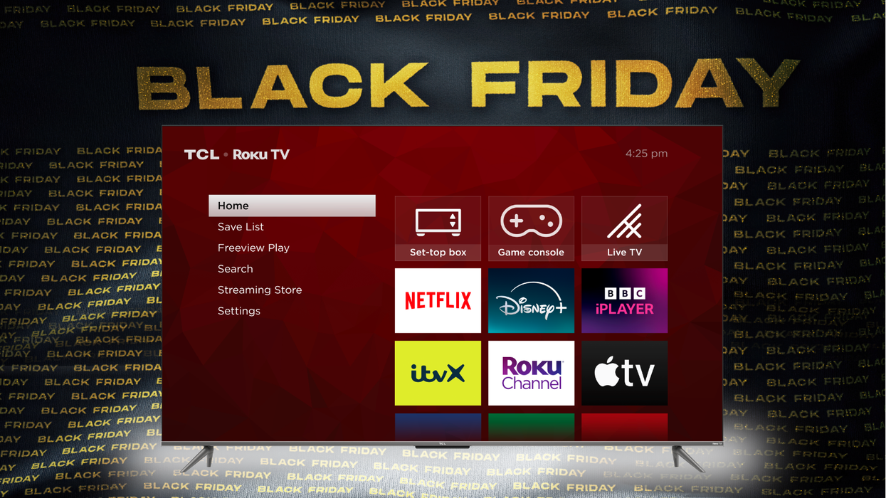 roku qled tv with a menu of streaming services shown on a black friday background