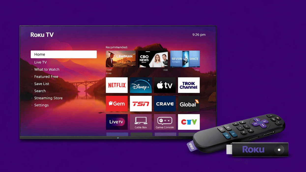 Roku streaming stick in front of TV