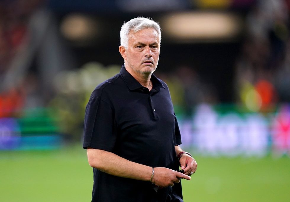 Roma manager Jose Mourinho walks off after being presented with his runner up medal following defeat in the UEFA Europa League Final at the Puskas Arena