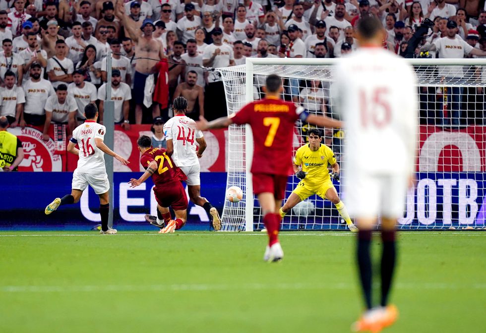 Roma's Paulo Dybala scores their side's first goal of the game during the UEFA Europa League Final at the Puskas Arena, Budapest