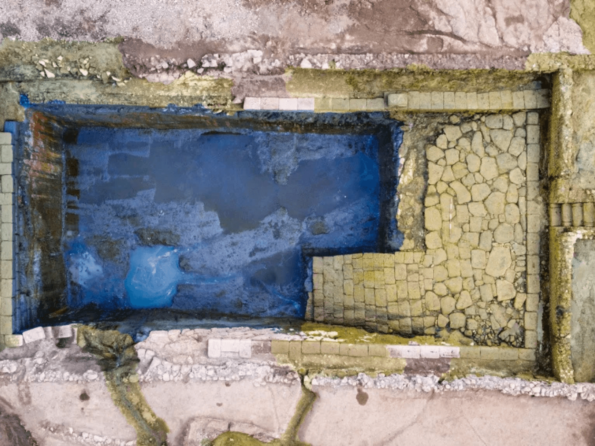Roman pool discovered under scrapyard in Italy