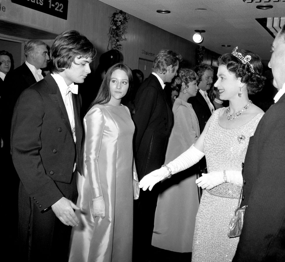 Romeo and Juliet stars Olivia Hussey and Leonard Whiting meet Queen Elizabeth II.