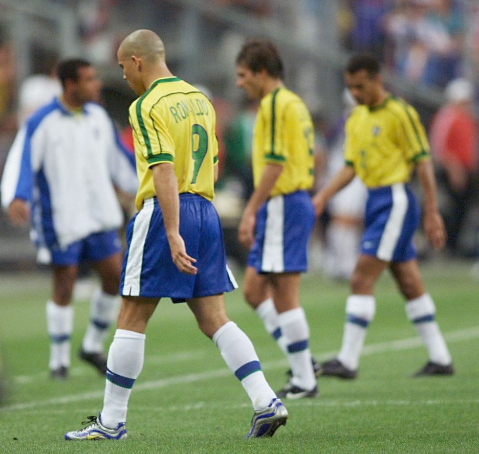 Ronaldo pictured walking off the pitch after Brazil's defeat to France in the 1998 World Cup final