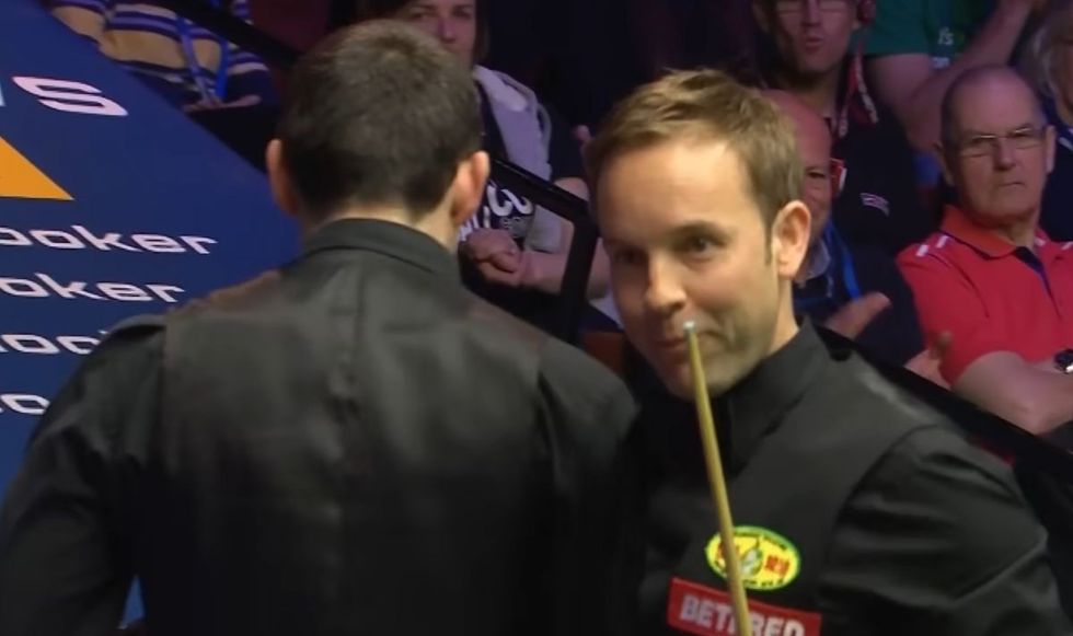 Ronnie O'Sullivan and Ali Carter barged shoulders