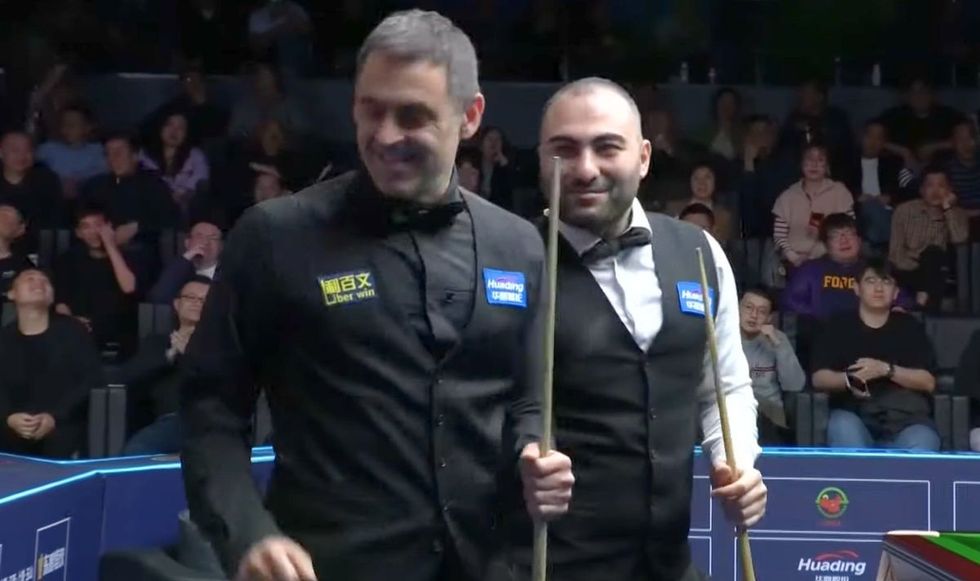 Ronnie O'Sullivan and Hossein Vafaei