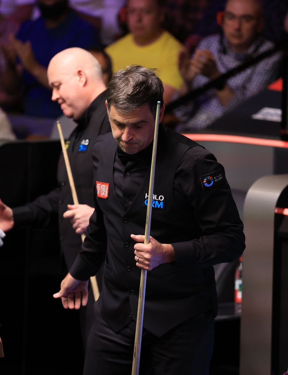 Ronnie O'Sullivan was outclassed by John Higgins at the World Snooker Championship