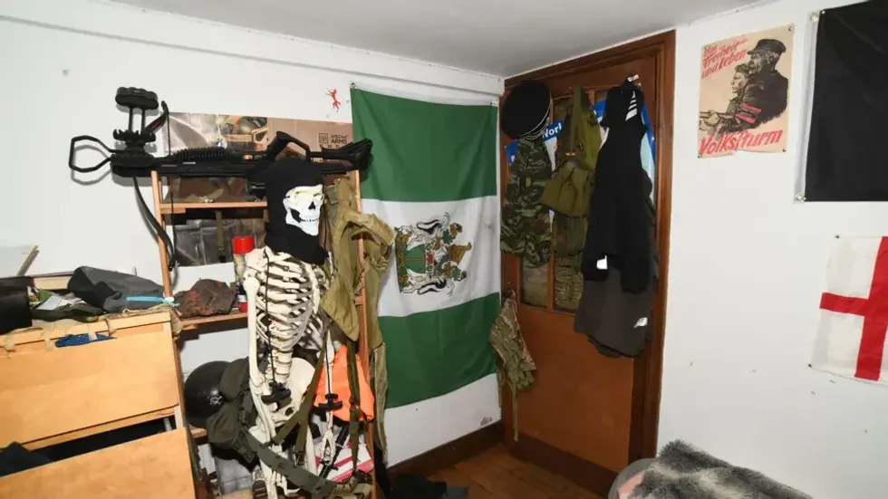 room decorated with white supremacist symbols