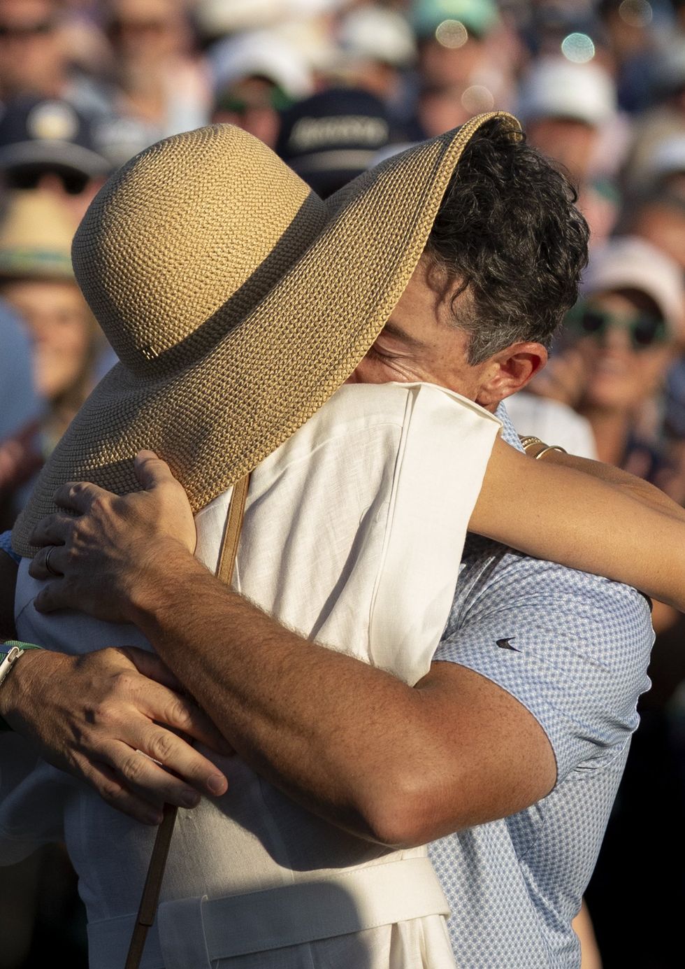Rory McIlroy embraced wife Erica Stoll after his Masters win