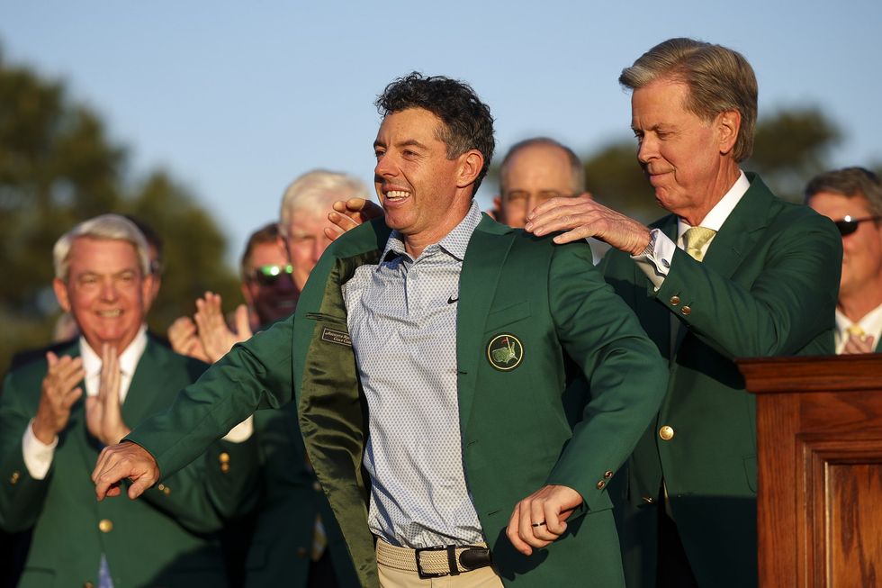 Rory McIlroy had made no secret of his desire to replicate Jack Nicklaus's famous 1966 moment by placing the green jacket on his own shoulders following a successful title defence