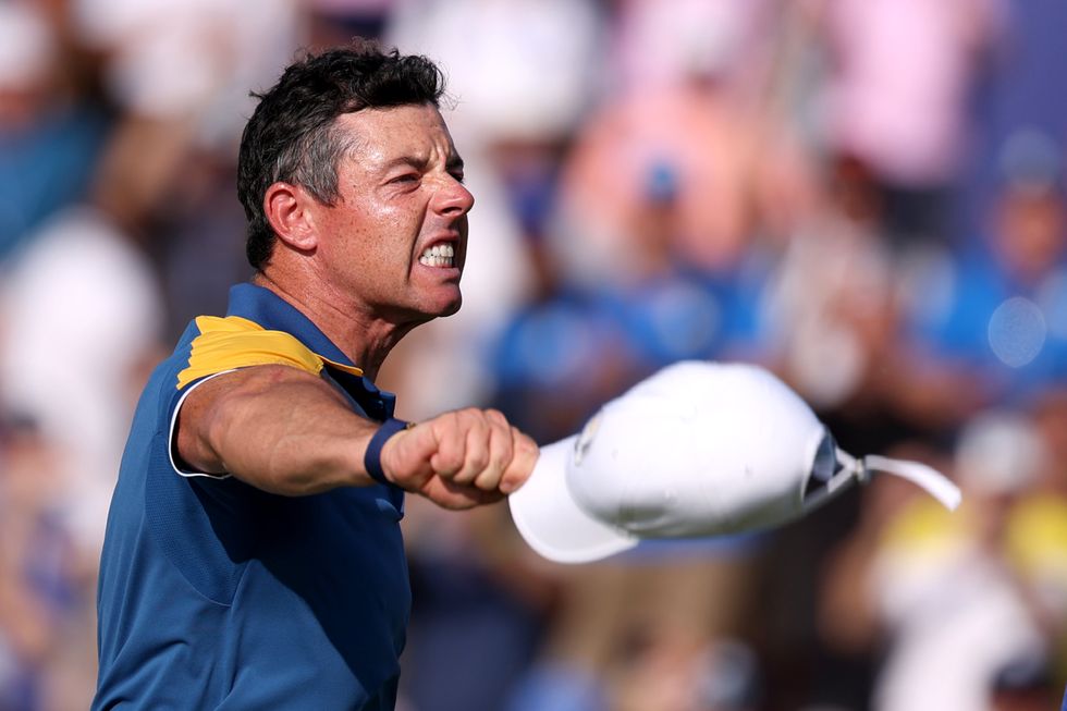 Rory McIlroy of Team Europe celebrates winning his match 3&1