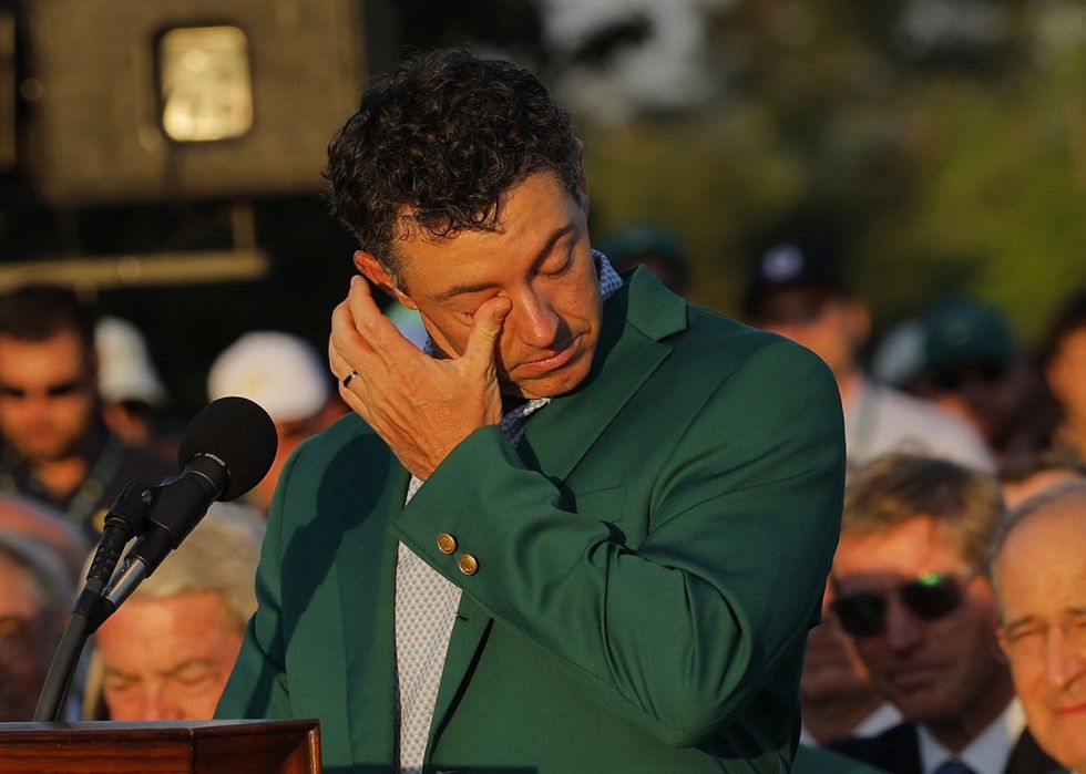Rory McIlroy tried to hold back tears as he thanked his mother and father in his victory speech
