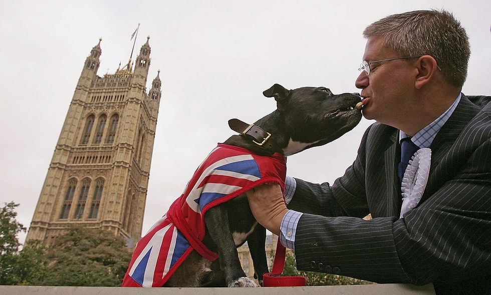 Rosindell with his dog outside Parliament\u200b