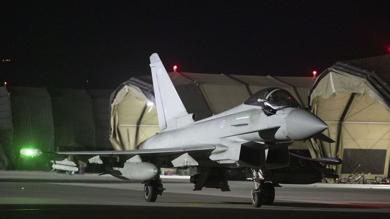 Royal Air Force Typhoon aircraft return to their base in the Middle East.