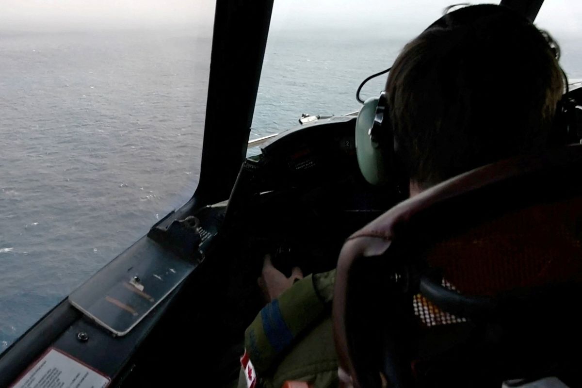 Royal Canadian Air Force CP-140 Aurora maritime surveillance aircraft searches for the missing OceanGate submersible