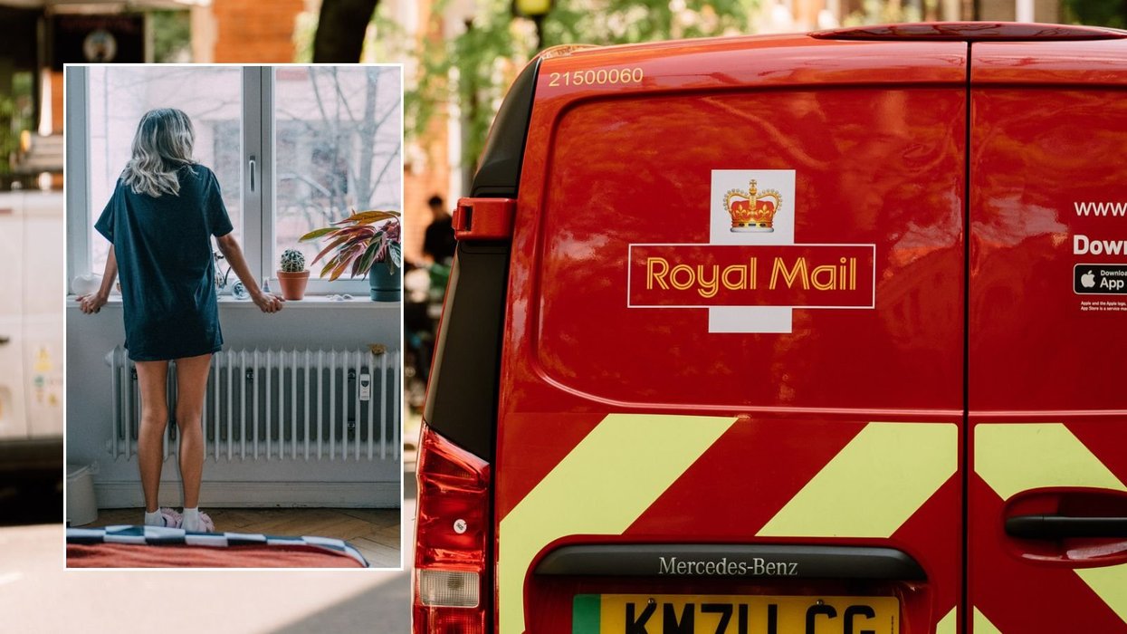 Royal Mail van and woman waiting by window