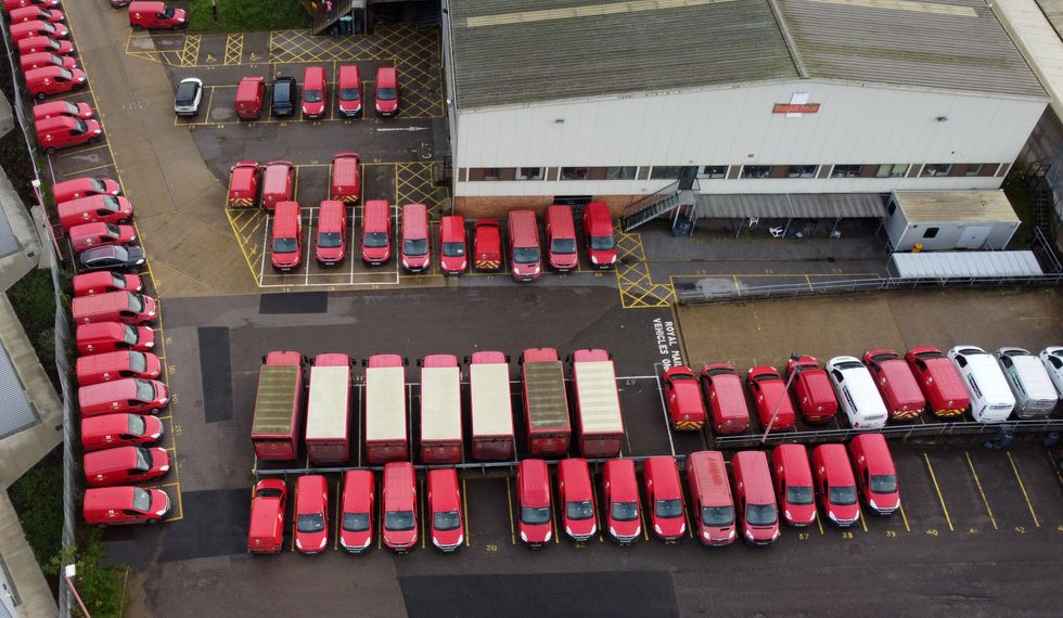 Royal Mail vehicles are parked at the Tonbridge Delivery Office in Tonbridge, Kent, as Members of the Communication Workers Union (CWU) hold a 48-hour strike in a long-running dispute over jobs, pay and conditions. Picture date: Thursday November 24, 2022.