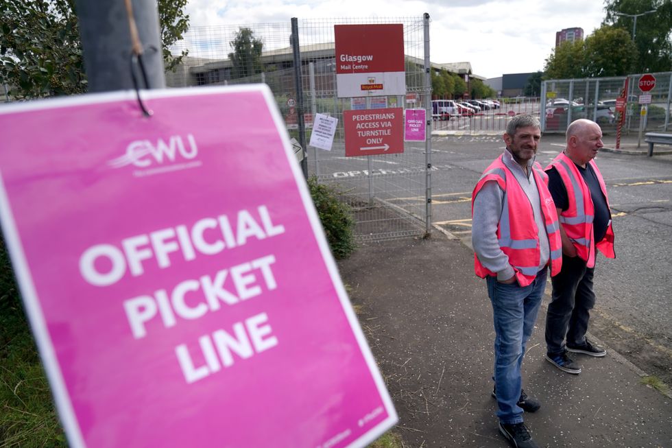 Royal Mail workers from the Communication Workers Union (CWU) on the picket line at the Glasgow Mail Centre. The CWU have said more than 100,000 workers are on picket lines outside Royal Mail offices across the country, making it the biggest strike of the summer. Picture date: Wednesday August 31, 2022.