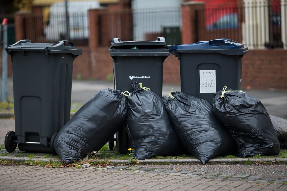 Rubbish bags piled up in front of bins in Birmingham