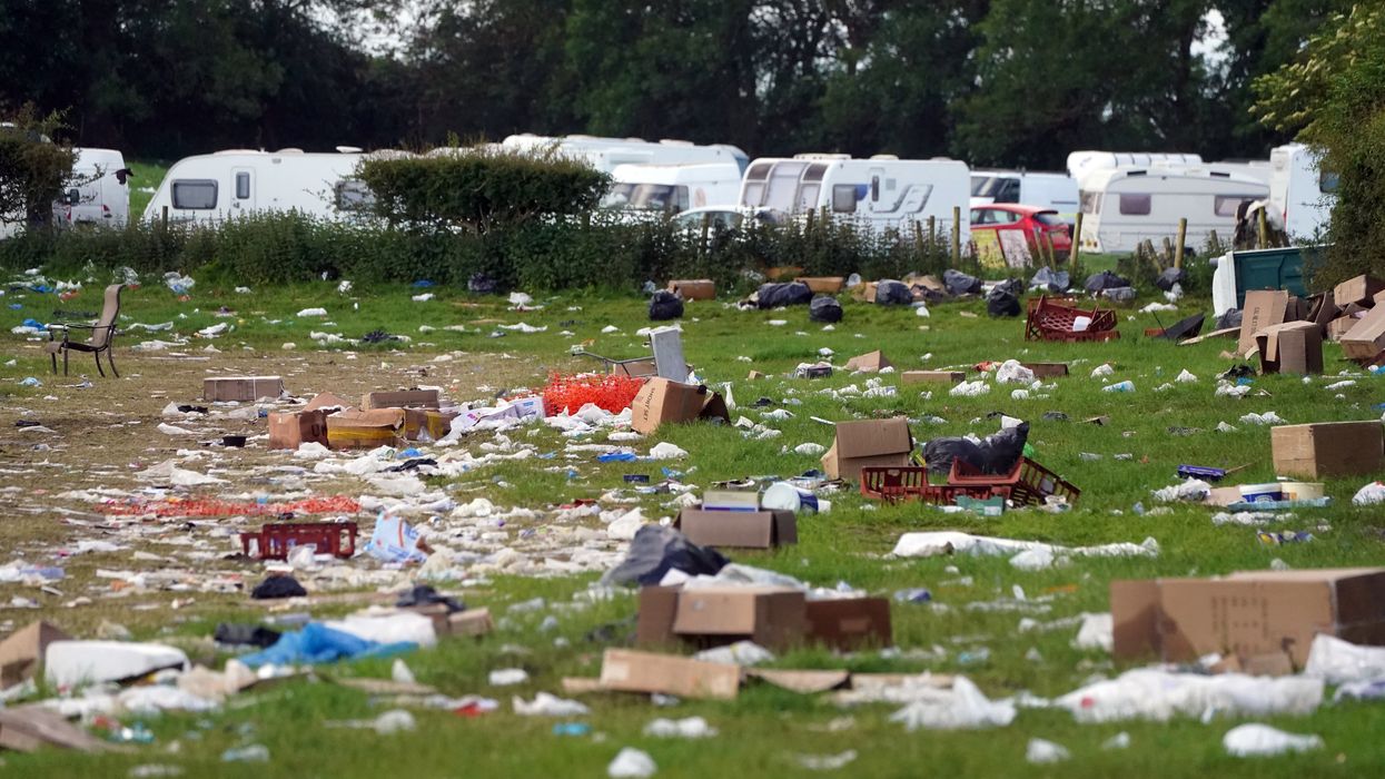 Rubbish in a field at the end of the Appleby Horse Fair, the annual gathering of the travelling community in Appleby, Cumbria