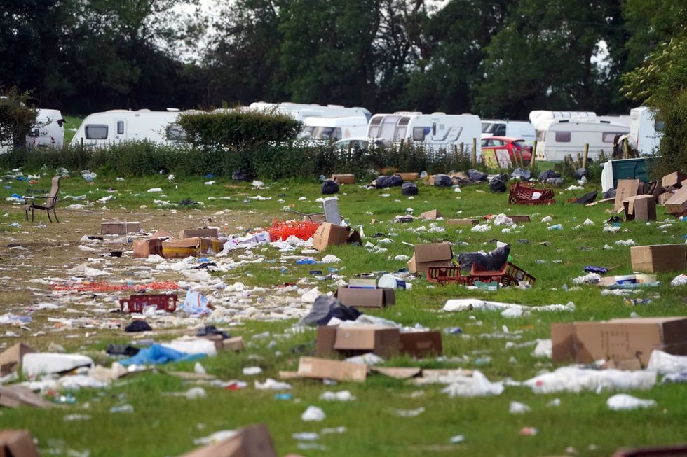 Rubbish in a field at the end of the Appleby Horse Fair, the annual gathering of the travelling community in Appleby, Cumbria