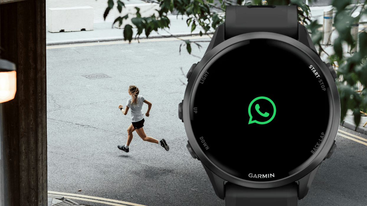 Runner next to Garmin watch displaying WhatsApp logo