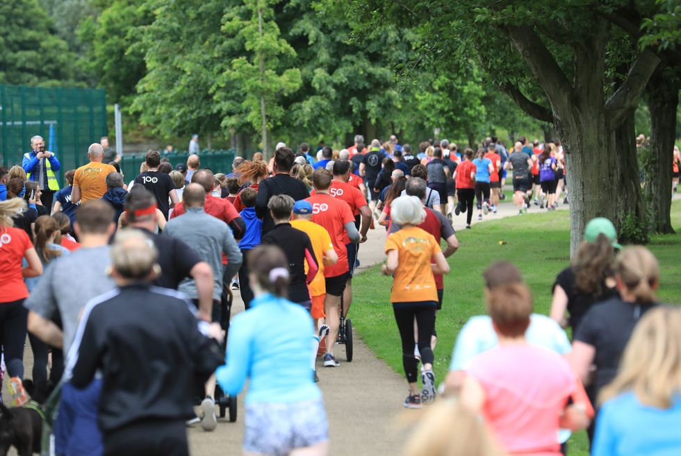 Runners take part in the 5km parkrun at Victoria Park in east Belfast