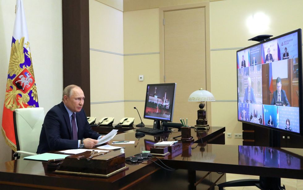 Russia's President Vladimir Putin chairs a meeting on the country's oil and gas industry with representatives of Russian energy companies and officials via a video link at a residence outside Moscow.