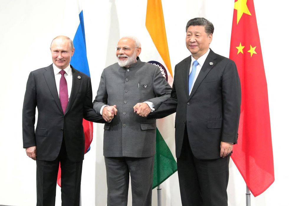 Russia's President Vladimir Putin (left), India's Prime Minister Narendra Modi (centre) and China's President Xi Jinping (right) at the G20 summit in Osaka, Japan in 2019.\u200b