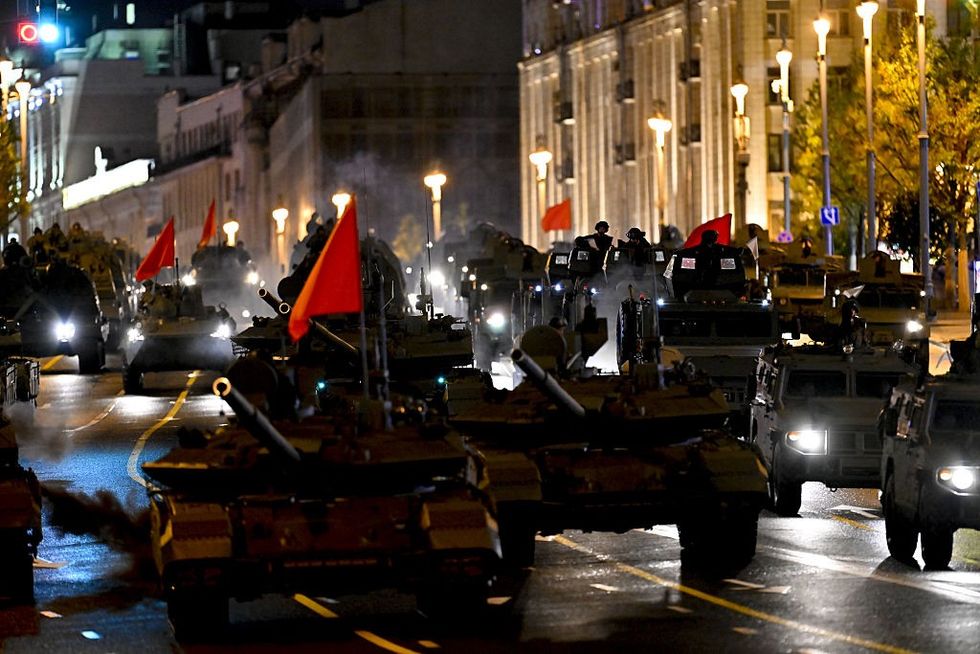 Russian military vehicles are on their way to Red Square as they pass through Tverskaya Street during the rehearsal of the Victory Day military parade \u200b