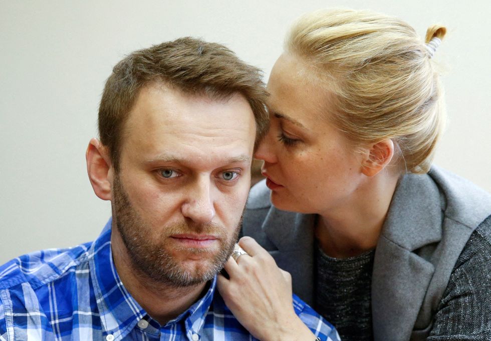Russian opposition leader Alexei Navalny and his wife Yulia in 2015