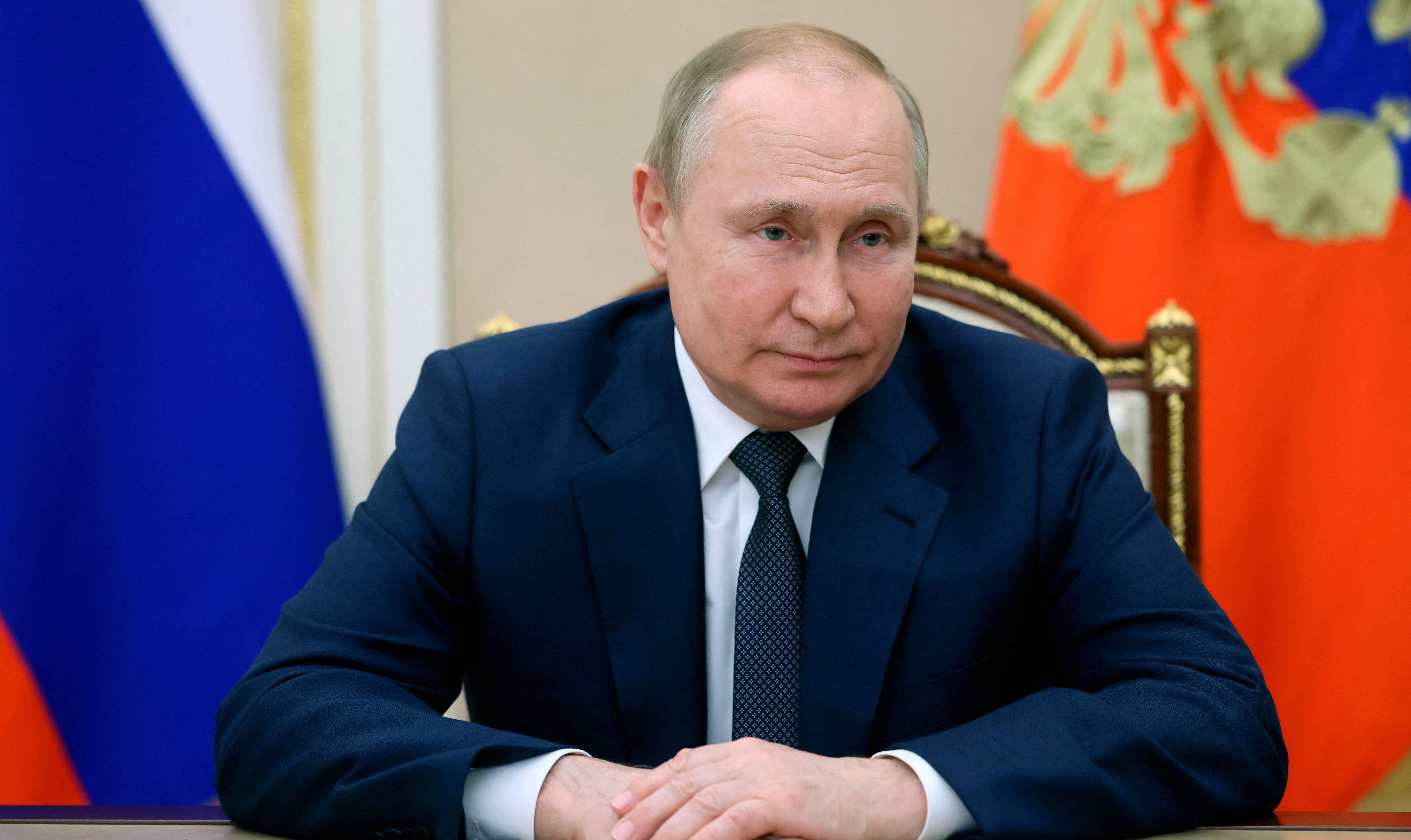 Russian President Vladimir Putin addresses participants of the IX Forum of Regions of Russia and Belarus, via video link in Moscow, Russia July 1