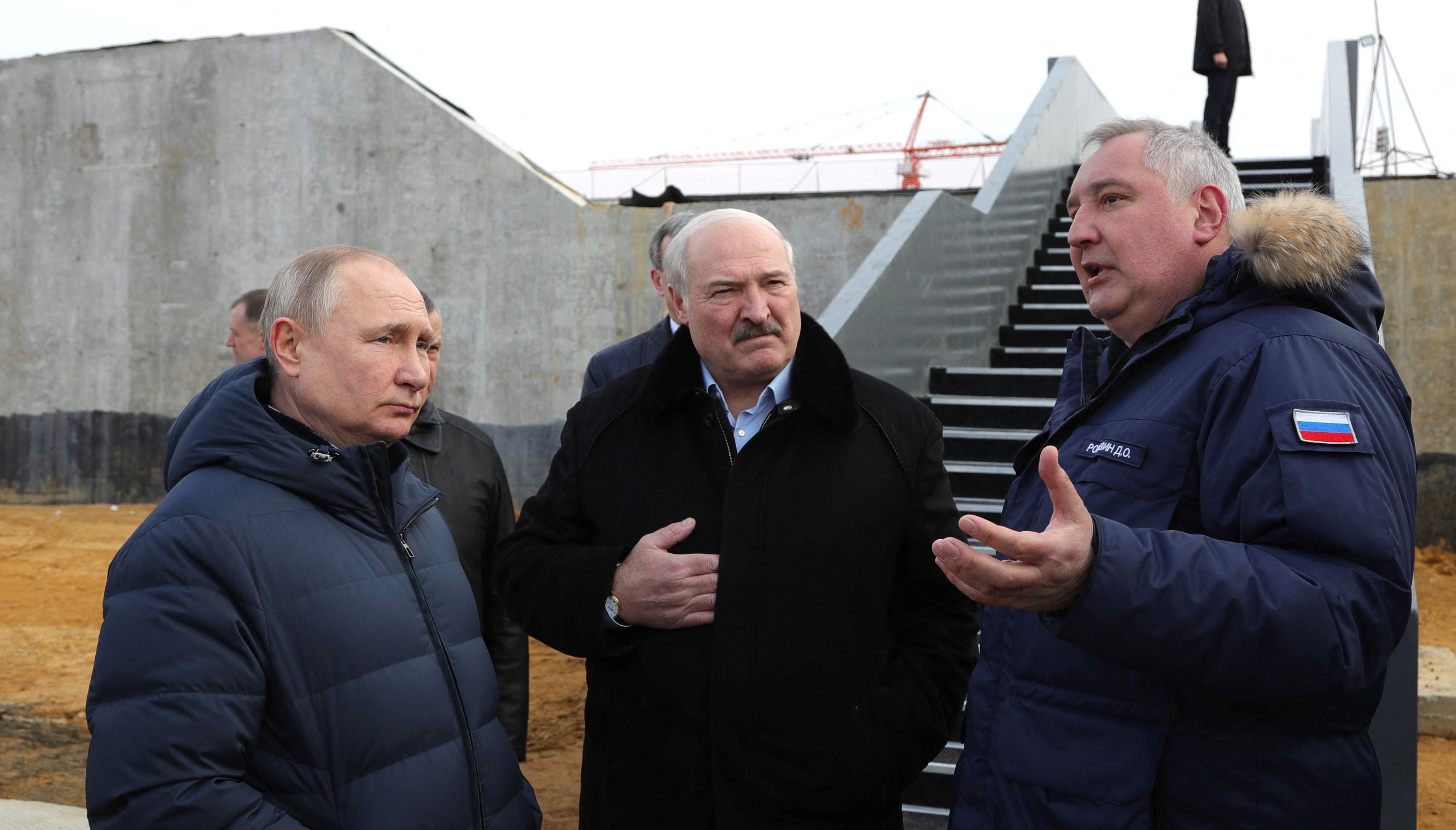Russian President Vladimir Putin and Belarusian President Alexander Lukashenko listen to Director General of Roscosmos Dmitry Rogozin as they visit the construction site of the Amur launch complex for Angara rockets at the Vostochny Cosmodrome in Amur Region.
