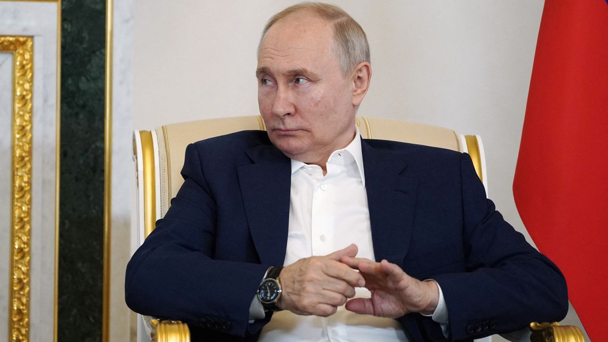Russian President Vladimir Putin attends a meeting with Belarusian President Alexander Lukashenko in Saint Petersburg