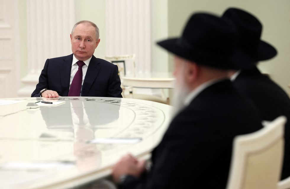 Russian President Vladimir Putin attends a meeting with Chief Rabbi of Russia Berel Lazar and head of the Federation of Jewish Communities of Russia Alexander Boroda at the Kremlin in Moscow, Russia January 26, 2023. Sputnik/Mikhail Metzel/Kremlin via REUTERS ATTENTION EDITORS - THIS IMAGE WAS PROVIDED BY A THIRD PARTY.