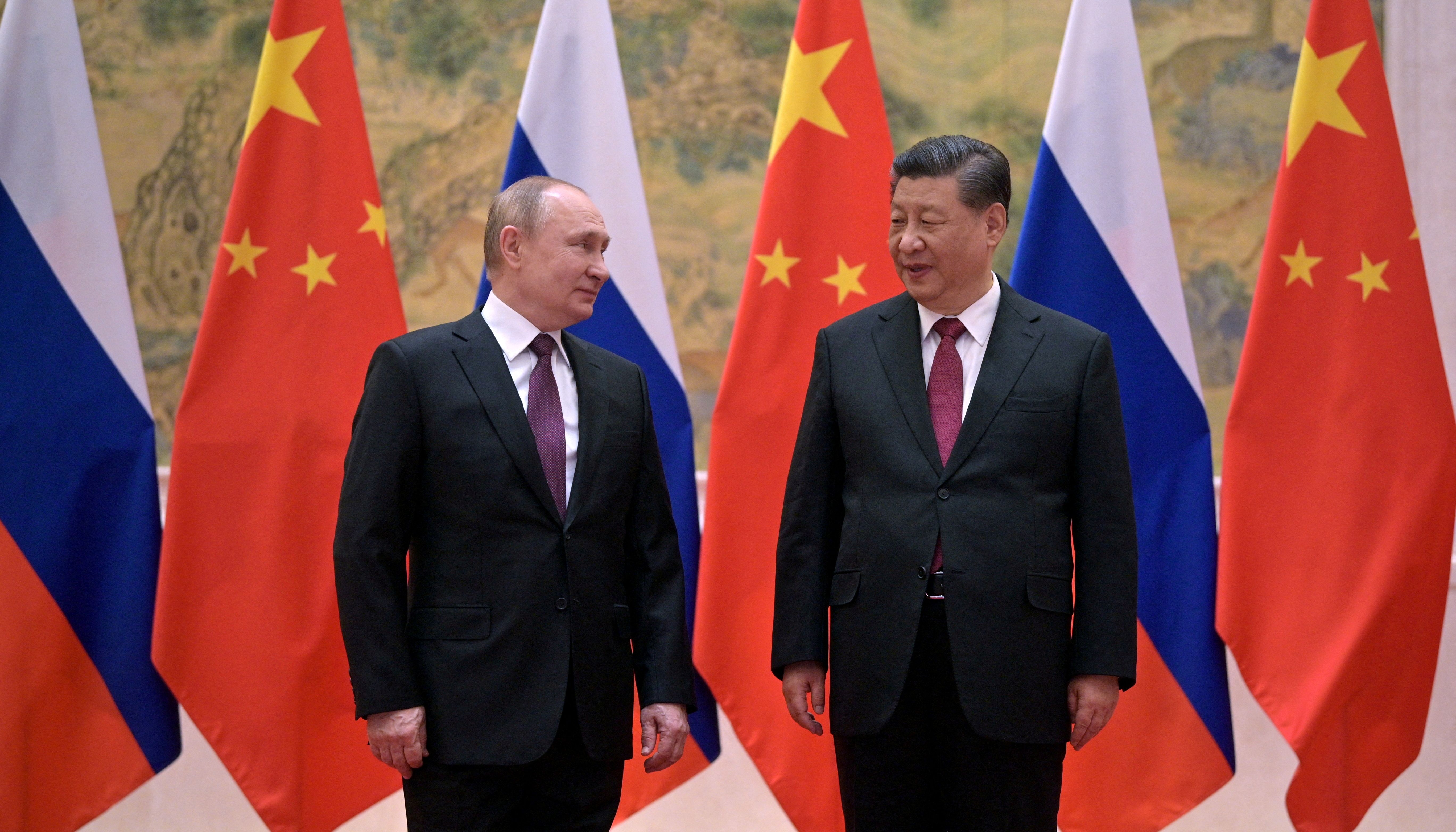 Russian President Vladimir Putin attends a meeting with Chinese President Xi Jinping in Beijing.