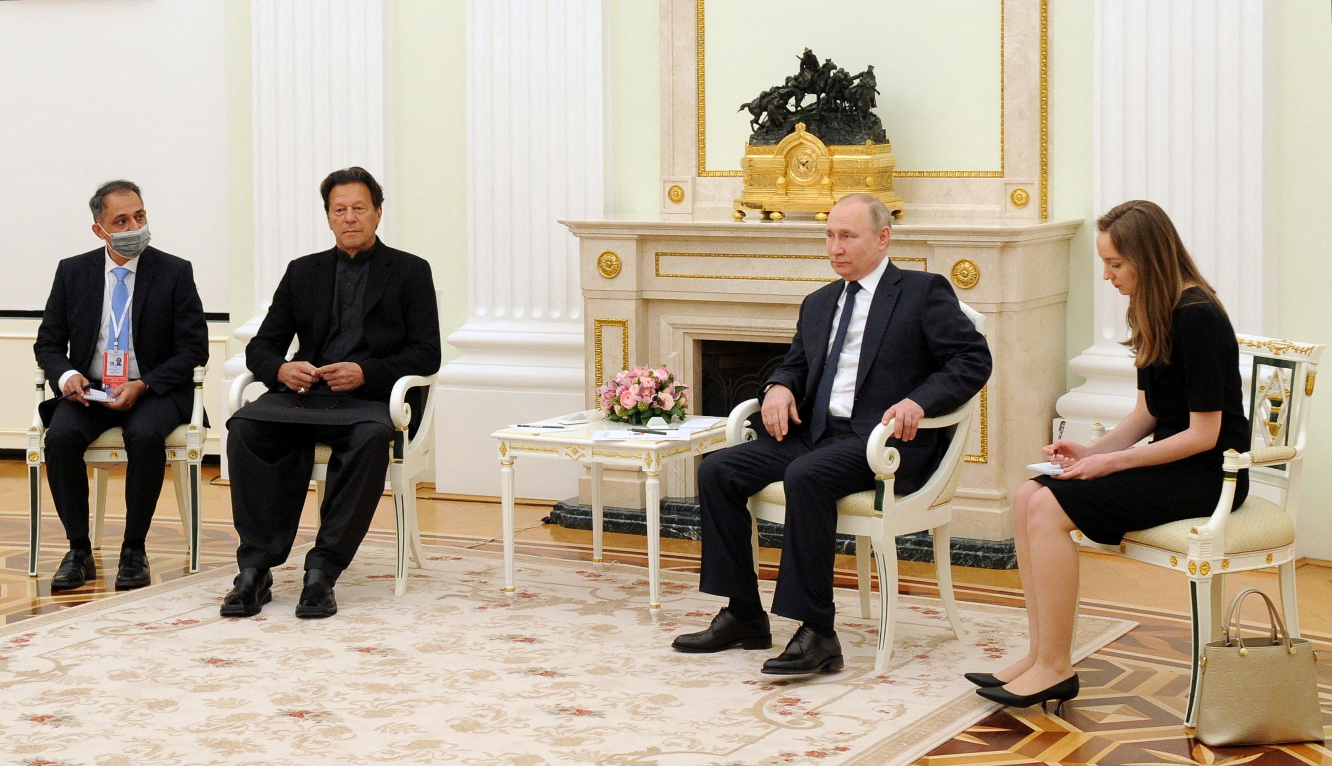 Russian President Vladimir Putin attends a meeting with Pakistan's Prime Minister Imran Khan in Moscow, Russia February 24, 2022. Sputnik/Mikhail Klimentyev/Kremlin via REUTERS ATTENTION EDITORS - THIS IMAGE WAS PROVIDED BY A THIRD PARTY.