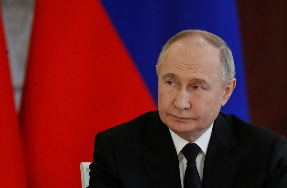 Russian President Vladimir Putin attends a sign docs ceremony during his meeting with King of Bahrain