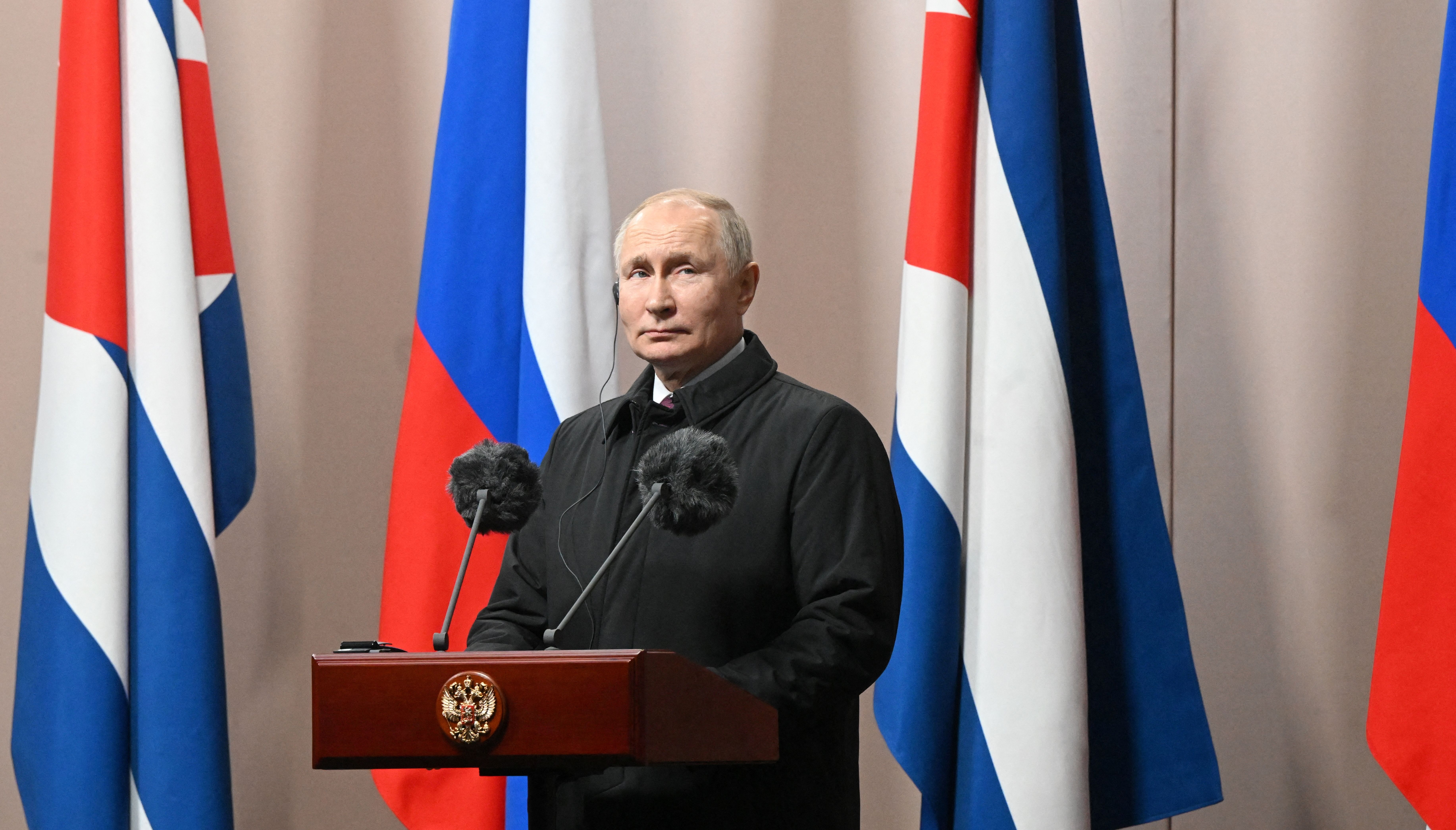 Russian President Vladimir Putin attends an unveiling ceremony of a monument to late Cuban leader Fidel Castro in Moscow, Russia November 22, 2022. Sputnik/Sergey Guneev/Kremlin via REUTERS ATTENTION EDITORS - THIS IMAGE WAS PROVIDED BY A THIRD PARTY.