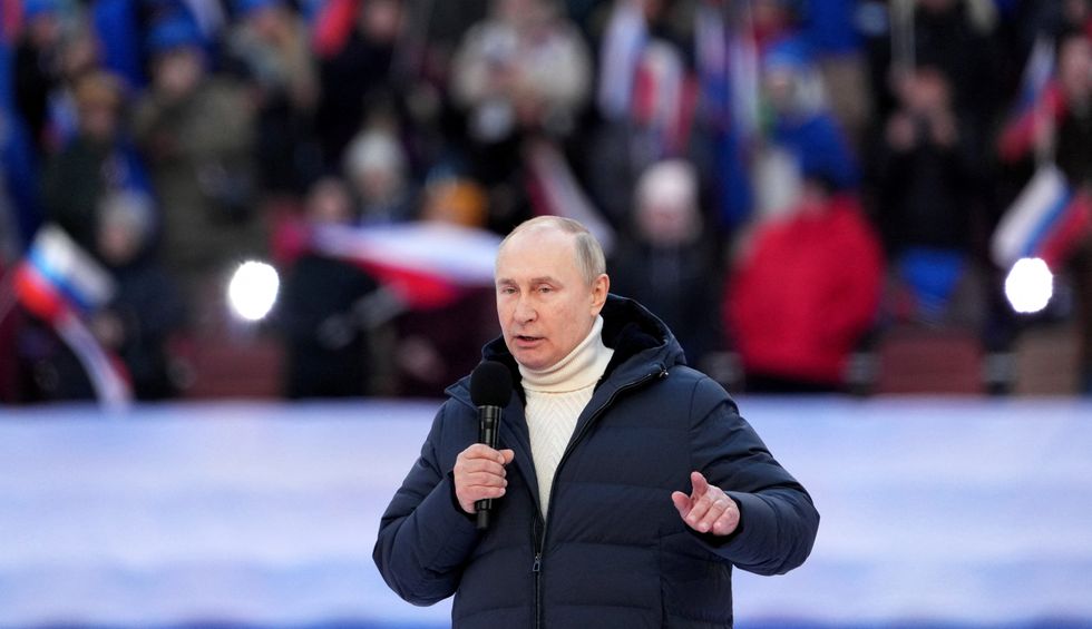 Russian President Vladimir Putin delivers a speech during a concert marking the eighth anniversary of Russia's annexation of Crimea at Luzhniki Stadium in Moscow, Russia March 18, 2022. RIA Novosti Host Photo Agency/Alexander Vilf via REUTERS