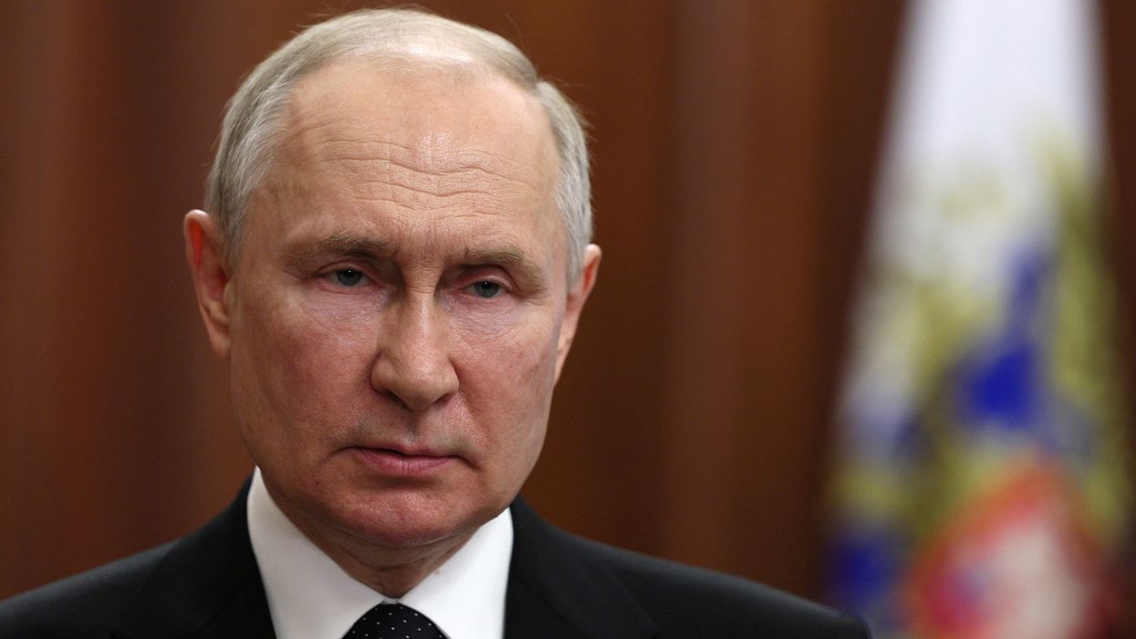 Russian President Vladimir Putin gives a televised address in Moscow
