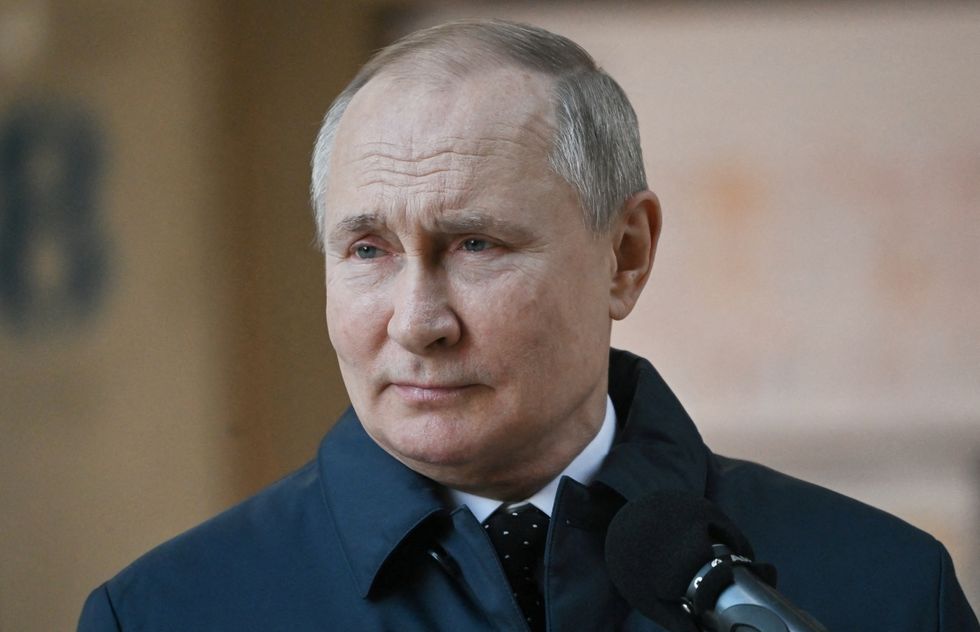 Russian President Vladimir Putin visits the construction site of the National Space Agency on the premises of the Khrunichev State Research and Production Space Centre, in Moscow, Russia February 27, 2022. Sputnik/Sergey Guneev/Kremlin via REUTERS ATTENTION EDITORS - THIS IMAGE WAS PROVIDED BY A THIRD PARTY.