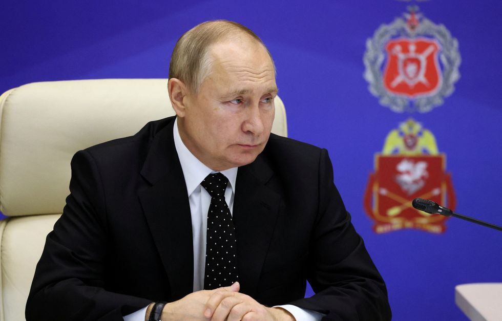 Russian President Vladimir Putin visits the Joint Headquarters of the Russian armed forces involved in military operations in Ukraine, in an unknown location in Russia, in this picture released December 17, 2022. Sputnik/Gavriil Grigorov/Kremlin via REUTERS ATTENTION EDITORS - THIS IMAGE WAS PROVIDED BY A THIRD PARTY.