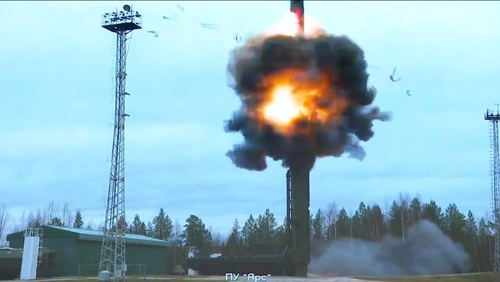 Russian propaganda images show test rockets being launched from the silo