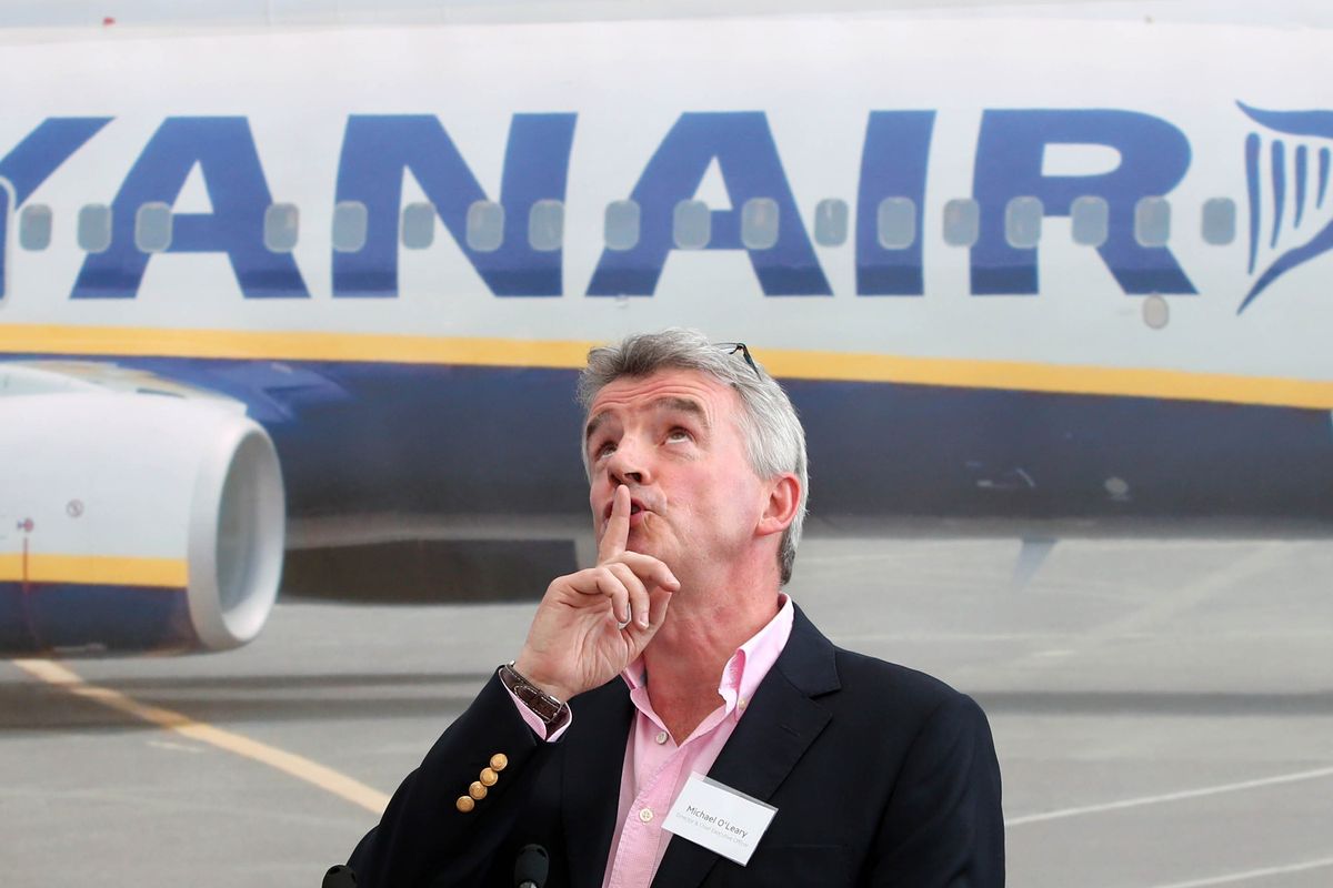Ryanair chief executive Michael O'Leary shh finger to his lips